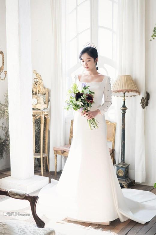 韩国女艺人张娜拉拍婚纱写真 展清纯动人魅力