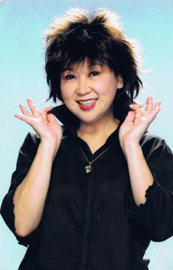 朱咪咪年轻照片曝光 了解其家庭背景