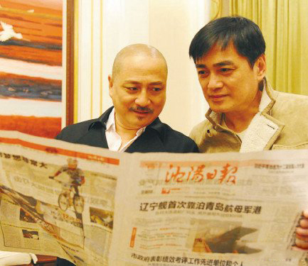 汤镇业汤镇宗兄弟情深 相互扶持闯出一片天地